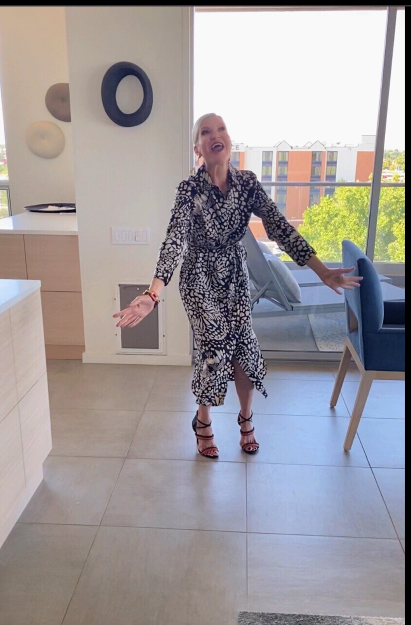 lifestyle Influencer, Jamie Lewinger of More Than Turquoise, wearing Chico's Black Label graphic print shirt dress