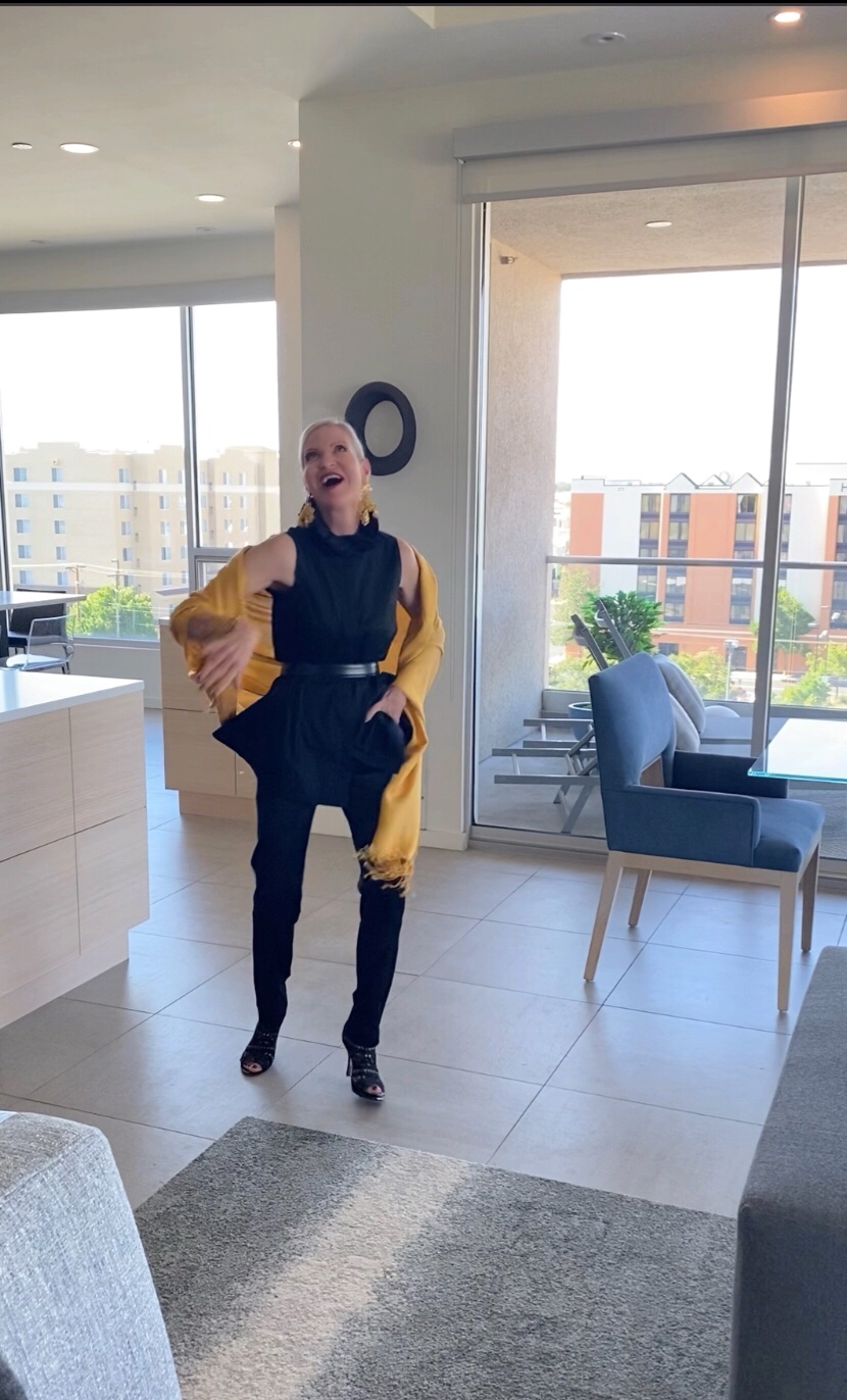 Lifestyle Influencer, Jamie Lewinger of More Than Turquoise wearing Chico's Black Label ruffle neck top