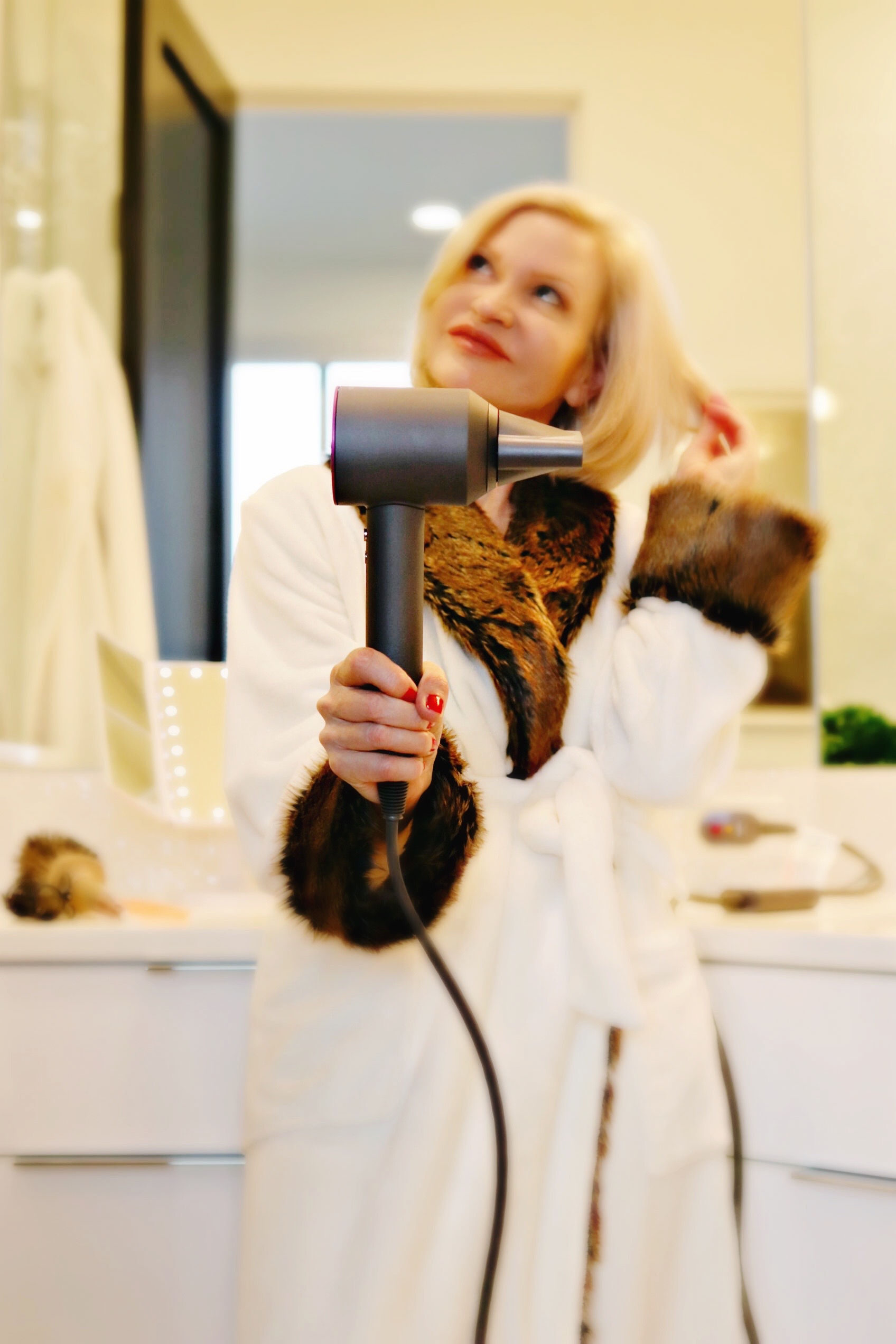 lifestyle Influencer, Jamie Lewinger of More Than Turquoise, trying the Dyson Supersonic Hair Dryer