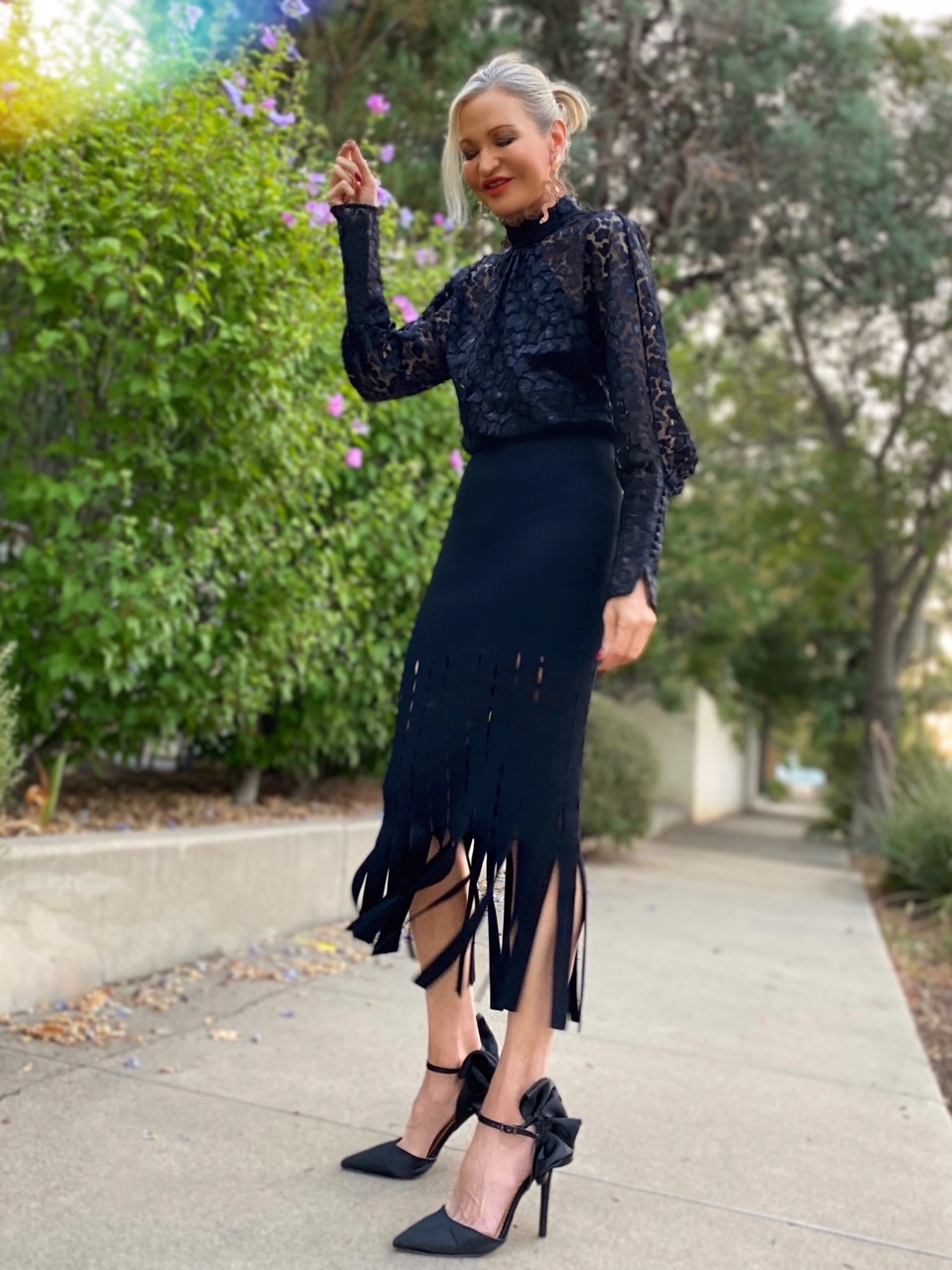 Lifestyle Influencer, jamie Lewinger of More Than Turquoise, wearing rented Jonathan Simkhai skirt from Armoire