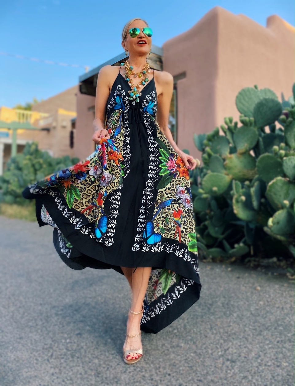 Lifestyle Influencer, Jamie Lewinger of More Than Turquoise, wearing rented Nicole Miller maxi dress from Armoire