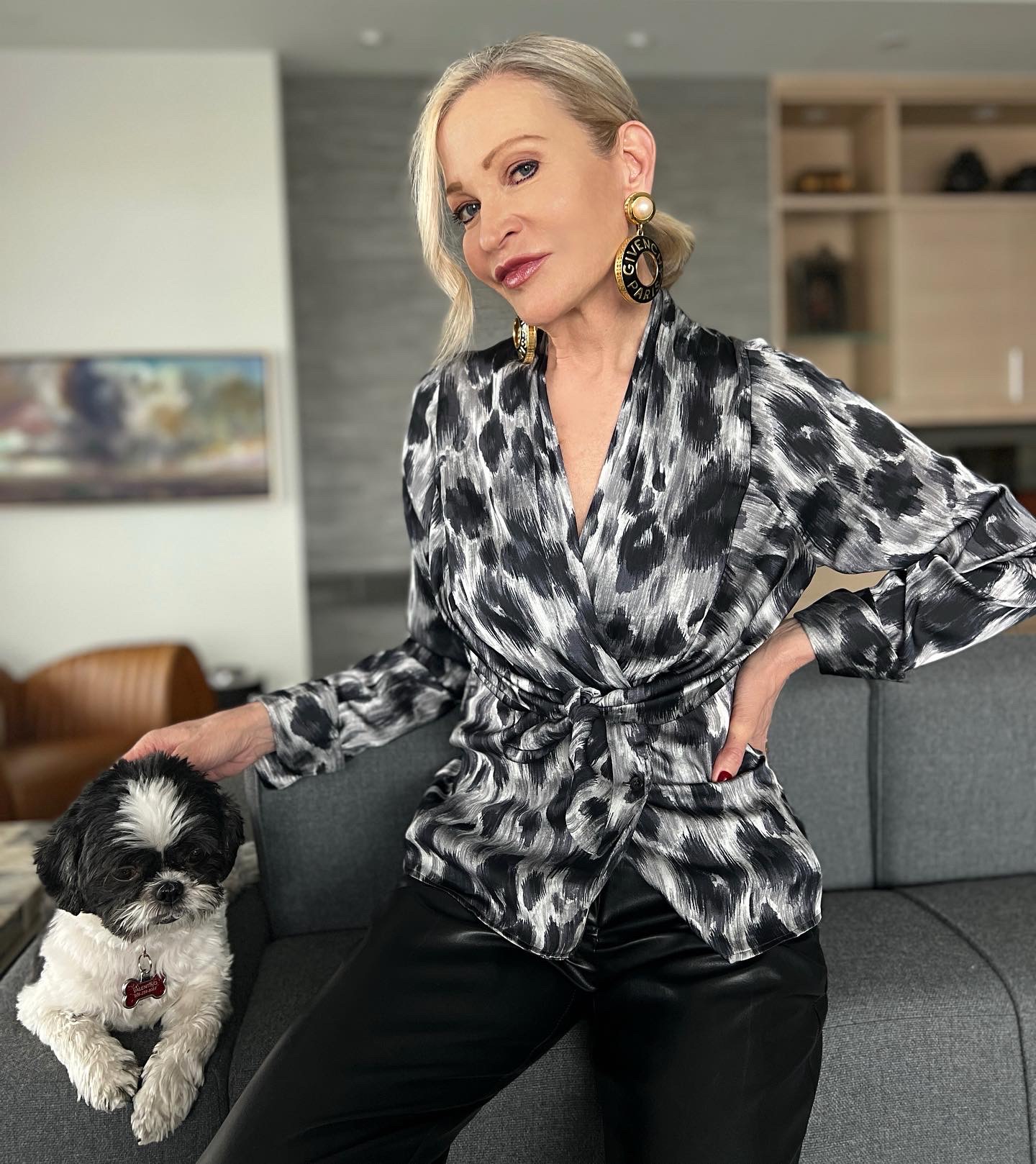 Lifestyle Influencer, Jamie Lewinger of More Than Turquoise, wearing the leopard blouse from Farinaz