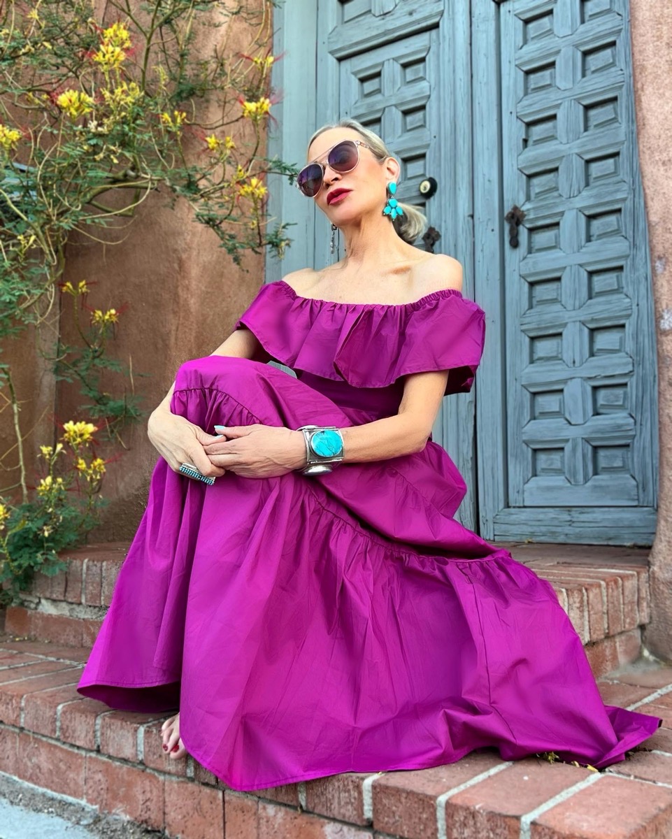 Lifestyle Influencer Jamie Lewinger of More Than Turquoise in fuchsia ruffled dress from SHein 