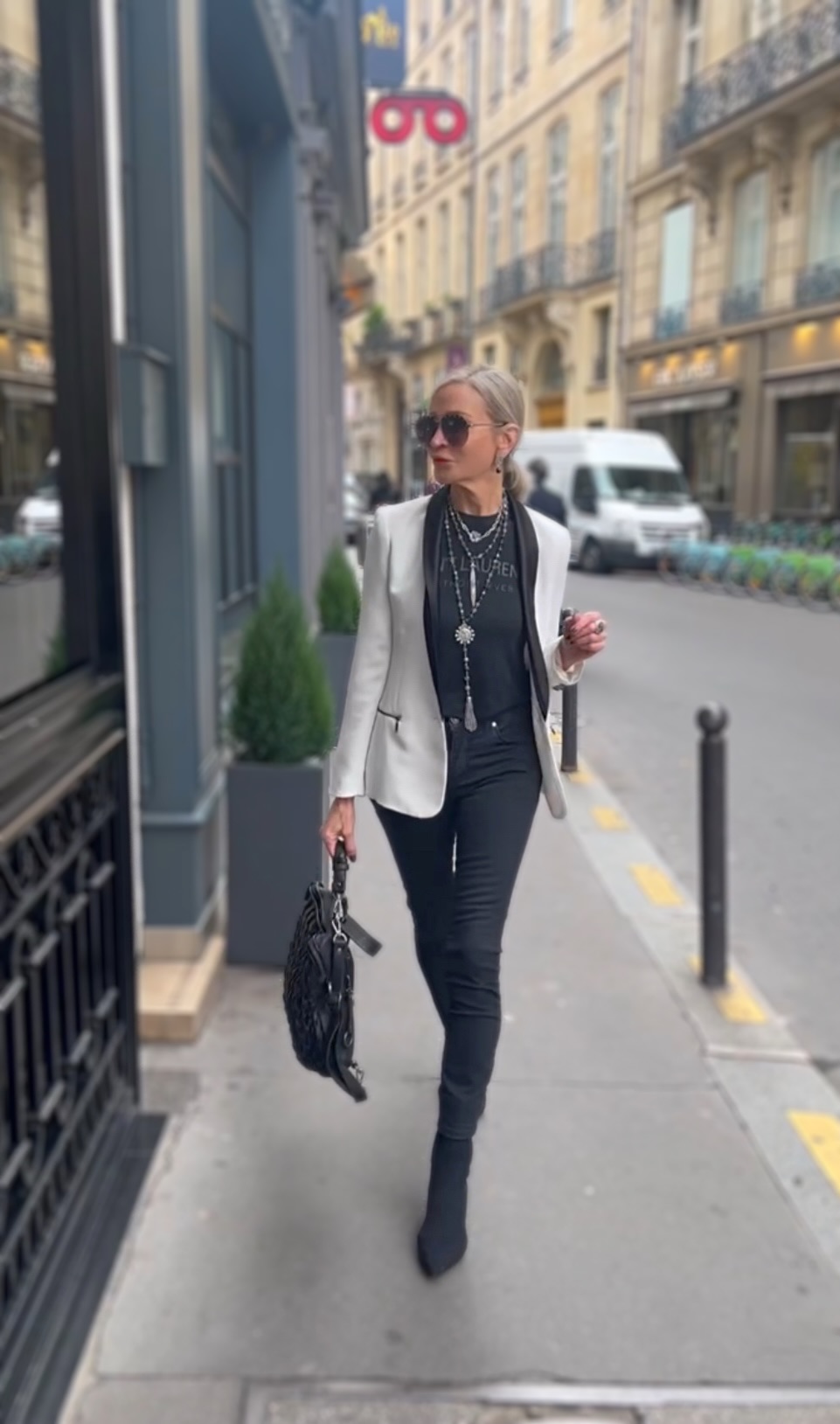 Lifestyle Influencer, Jamie Lewinger of More Than Turquoise wearing French Kande slate mix pieces in Paris France  