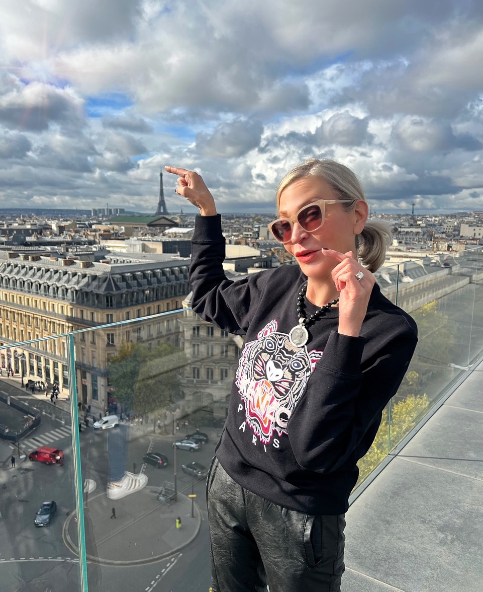 Lifestyle influencer, Jamie Lewinger of More Than Turquoise wearing French Kande faceted black onyx with ministry medallion necklace  at the eiffle tower  in Paris France 
