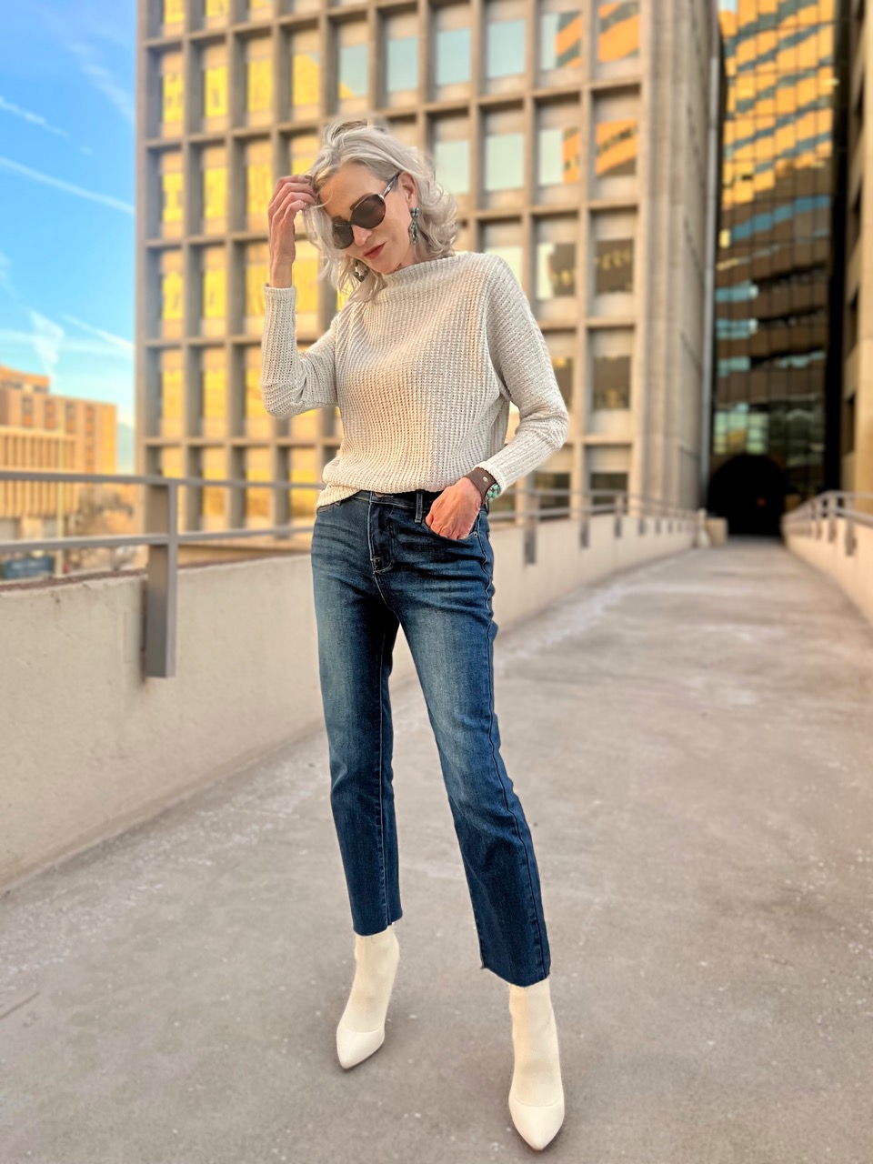 Lifestyle Influencer, Jamie Lewinger of More Than Turquoise wearing GIGI Essential  Mini-Flare Leg denim with raw hem from Gibsonlook 