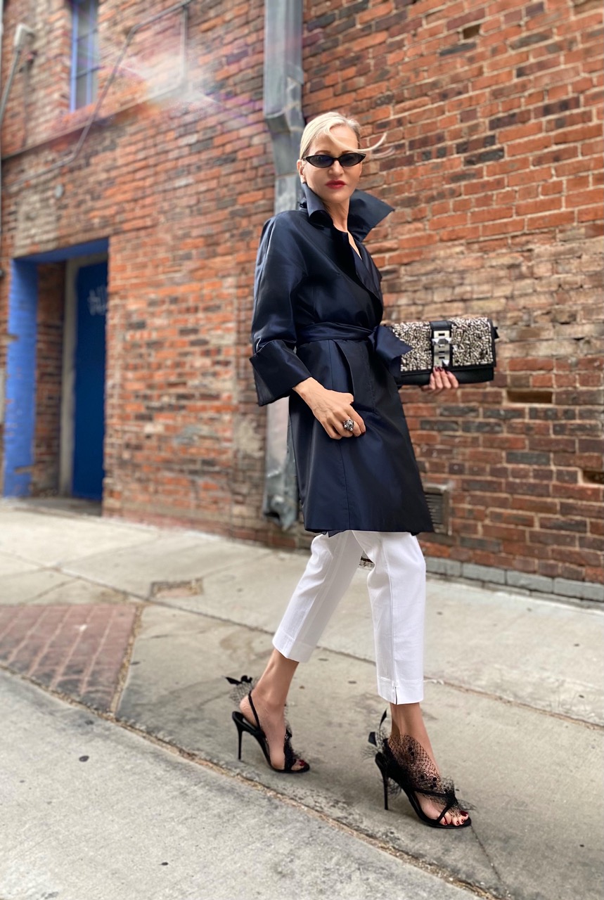 Lifestyle Influencer, Jamie Lewinger of More Than Turquoise, renting Andrea Mondin feather sandals from wardrobe