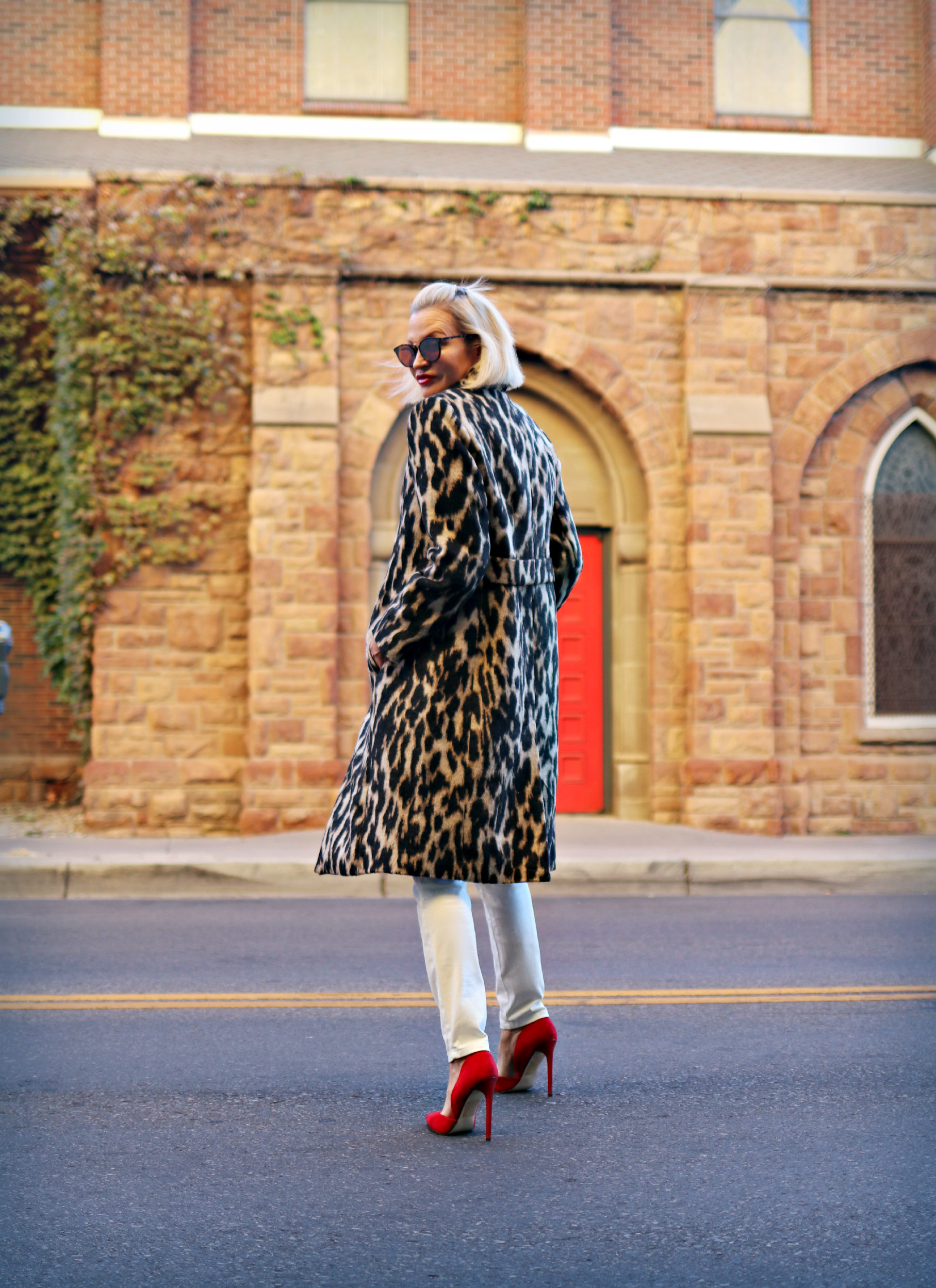 style Influencer, Jamie Lewinger of More Than Turquoise , wearing chico's plush animal print jacket