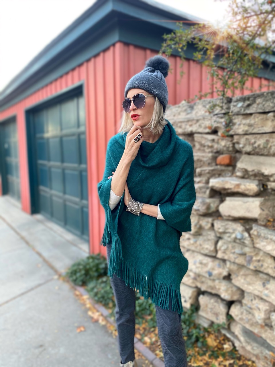 Lifestyle Influencer, Jamie Lewinger of More Than Turquoise, wearing Cozy Cowlneck poncho form Chicos 