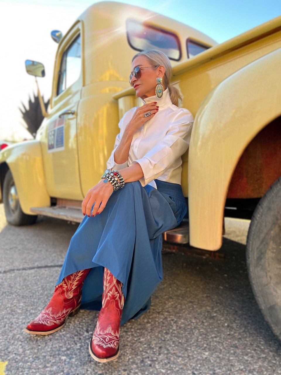 Lifestyle Influencer Jamie Lewinger of More Than Turquoise wearing Smoldering Ruby Red Lexington Boots  from Lane Boots 