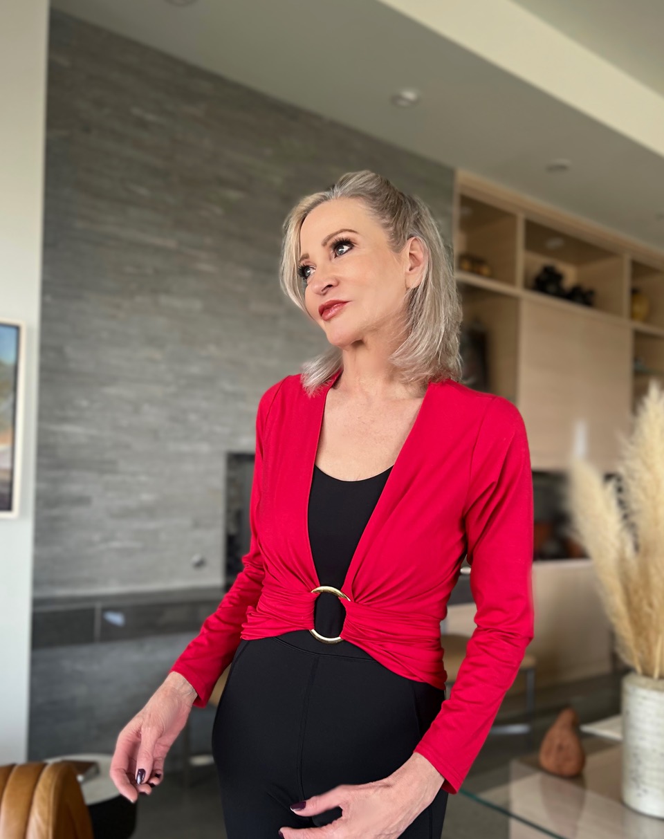 Lifestyle Influencer, Jamie Lewinger of More Than Turquoise wearing Diane Kroe wrap top with Pamela Lauz Synergy cuff styled as a belt