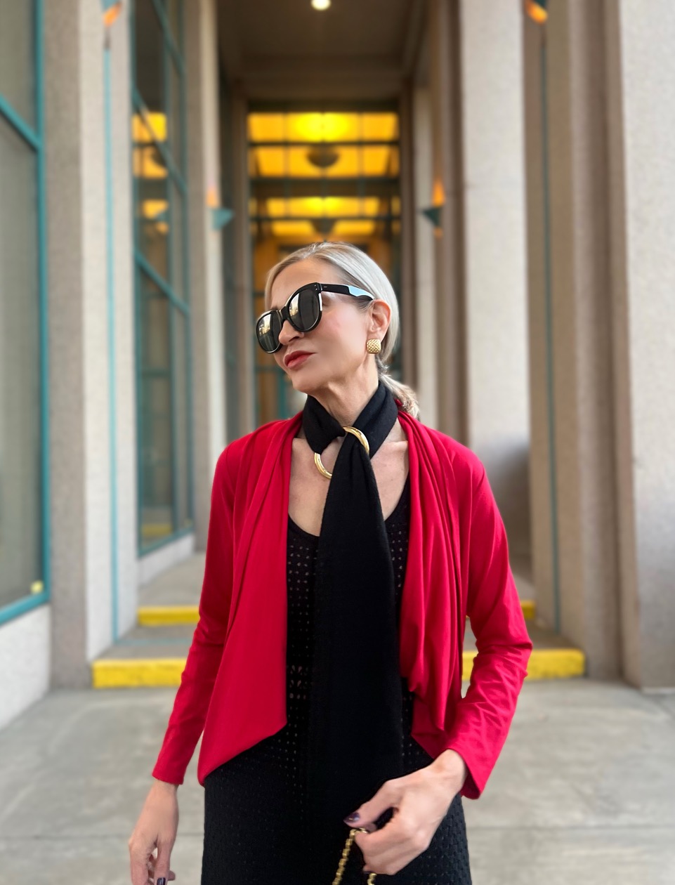 Lifestyle Influencer, Jamie Lewinger of More Than Turquoise   Diane Kroe wrap top in red  & Pamela Lauz  Synergy cuff in gold 