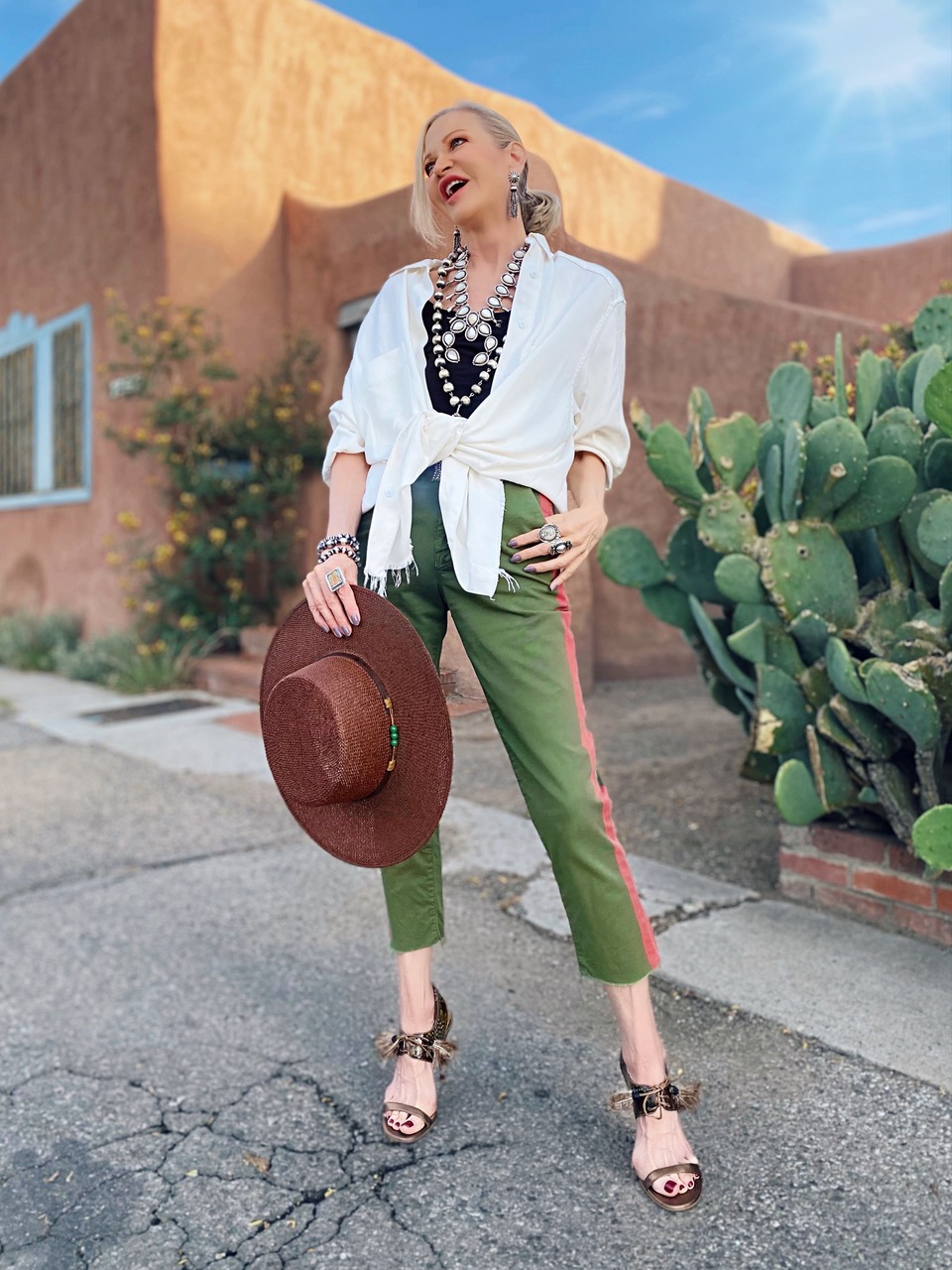 Lifestyle Influencer, Jamie Lewinger of More Than Turquoise, wearing thrifted Mother Denim pants from Refinery Resale 