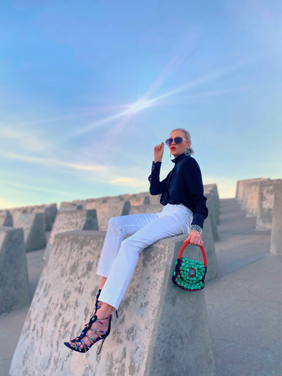 Lifestyle Influencer, Jamie Lewinger of More Than Turquoise, wearing no-stain white girlfriend ankle jeans from chico's 