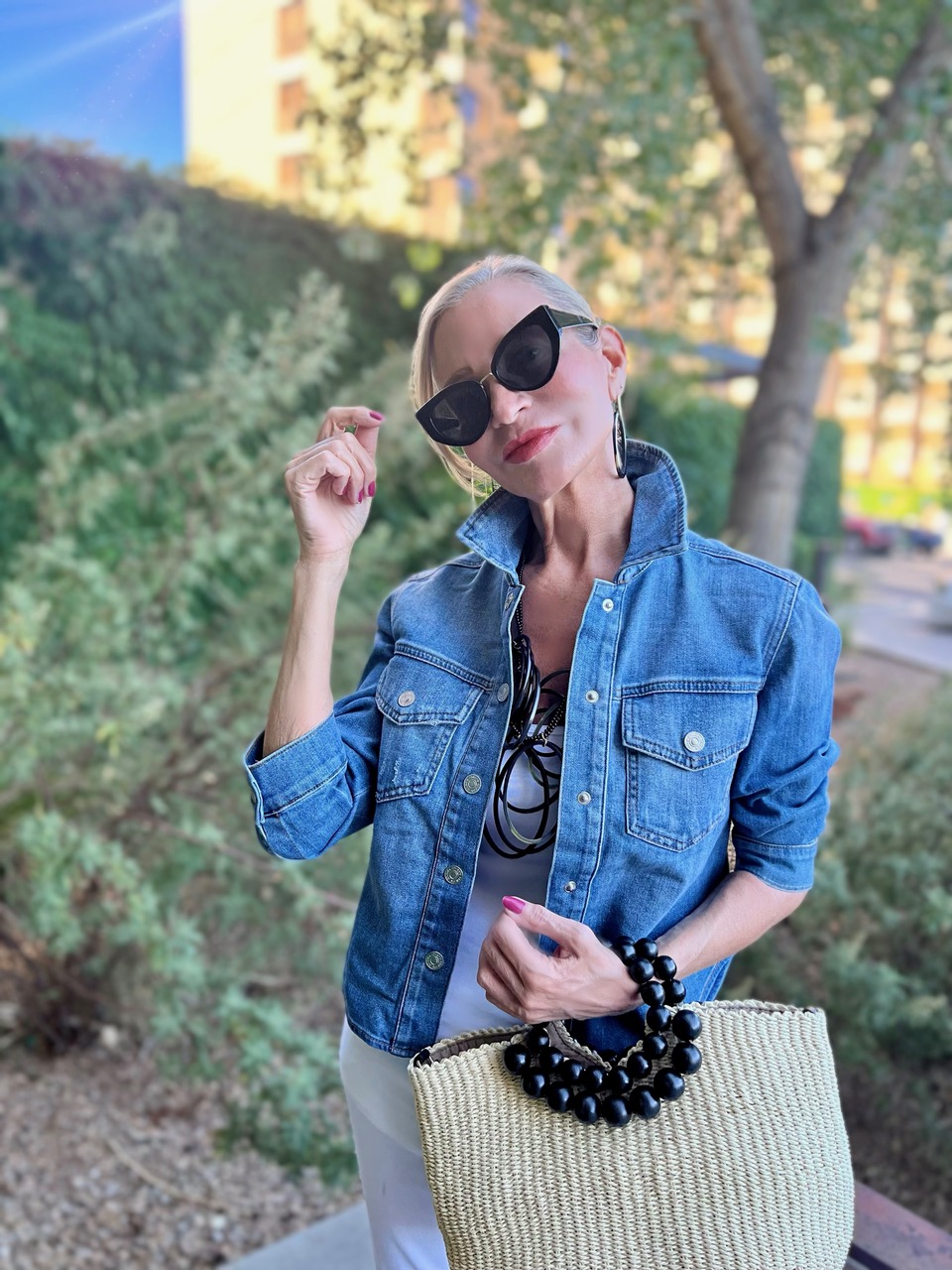 Lifestyle Influencer, Jamie Lewinger of More Than Turquoise wearing statement bib necklace  from chico's 