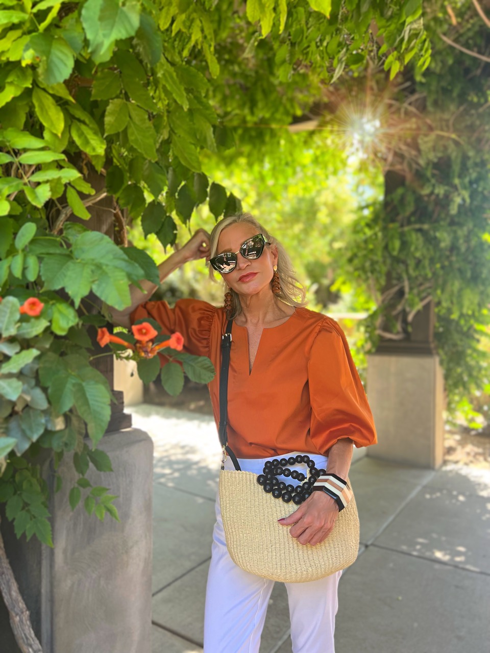 Lifestyle Influencer, Jamie Lewinger of More Than Turquoise wearing bead handle bag from Chico's 