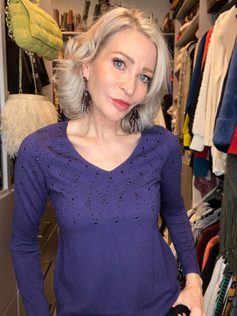 Lifestyle Influencer, Jamie Lewinger of More Than Turquoise wearing studded v-neck sweater from Chicos  in purple 