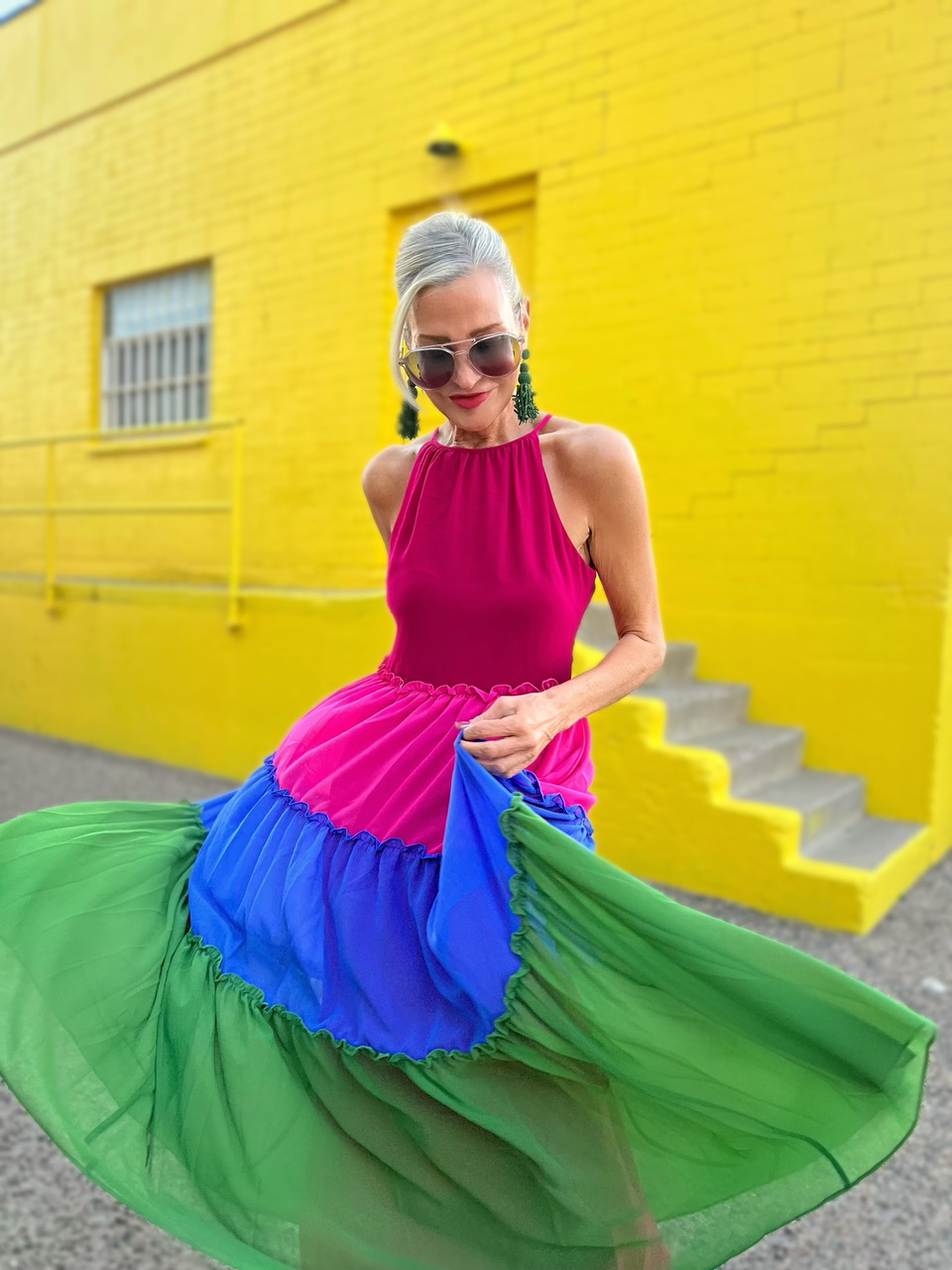 Lifestyle Influencer, Jamie Lewinger of More Than Turquoise wearing colorblock halter dress from chico's 