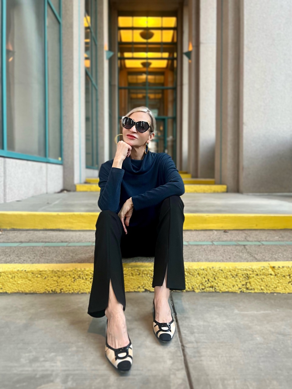 Lifestyle Influencer, Jamie Lewinger of More Than Turquoise wearing Clara Sunwoo Center Seam Front Slit Ankle Pant in black 