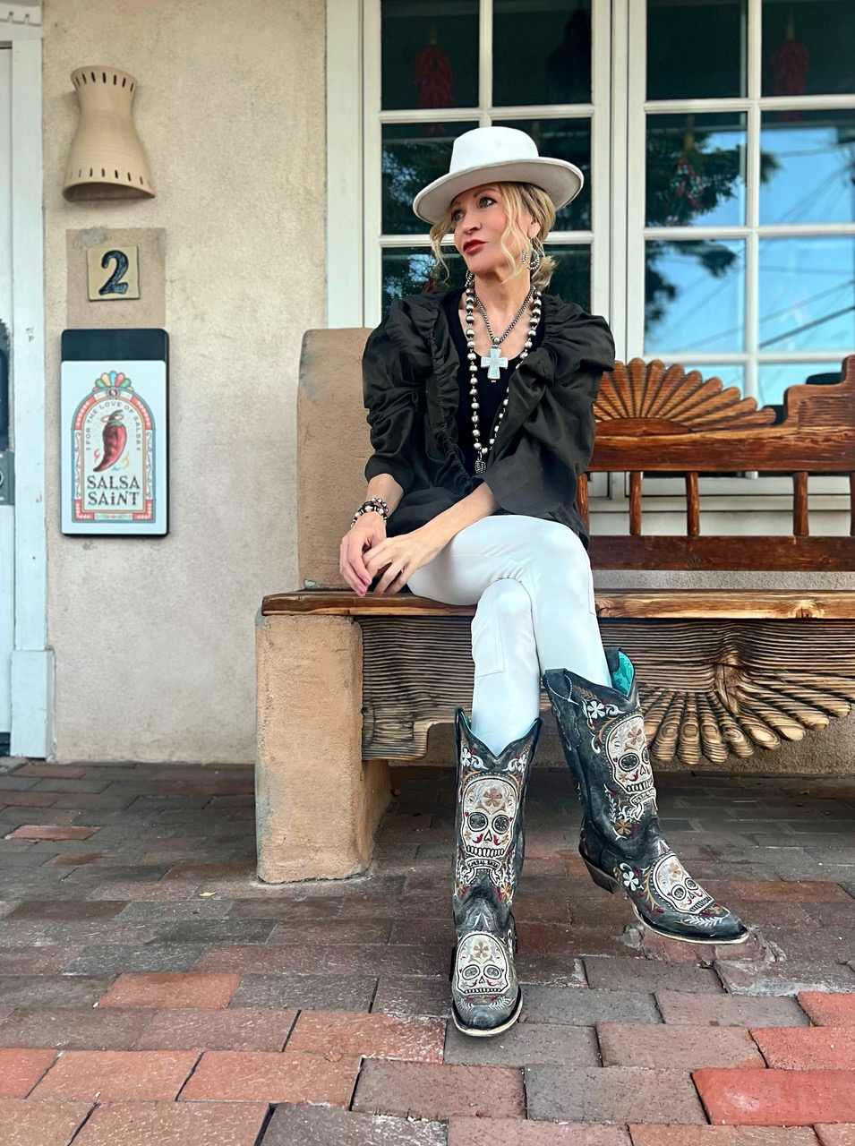 Lifestyle Influencer, Jamie Lewinger of More Than Turquoise wearing black  Corral Western Boots 
