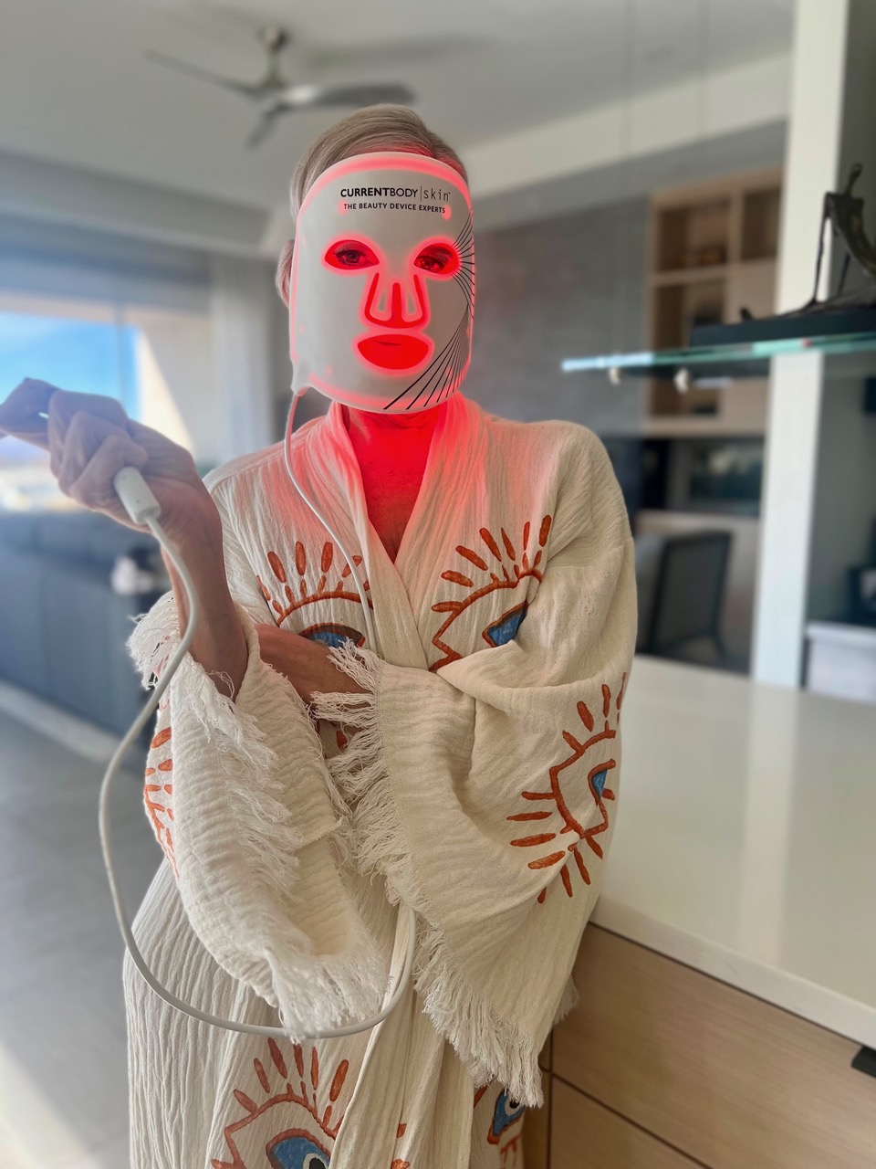 Lifestyle Influencer, Jamie Lewinger of More Than Turquoise wearing the CurrentBody LED Face Mask 