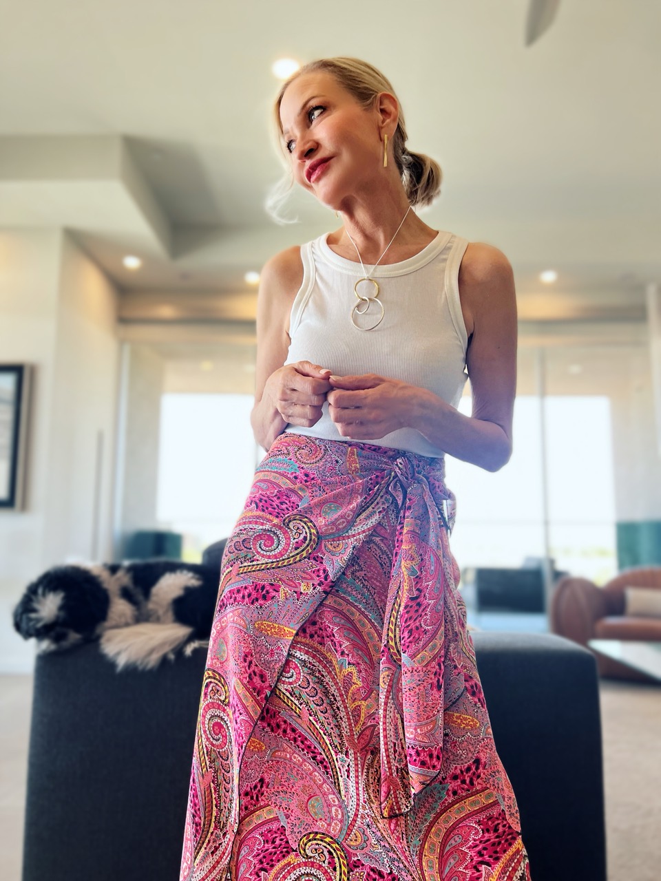 Lifestyle Influencer, Jamie Lewinger of More Than Turquoise styling Diane Kroe Butterfly wrap as a sarong skirt and Pamela Lauz Mobius Tr