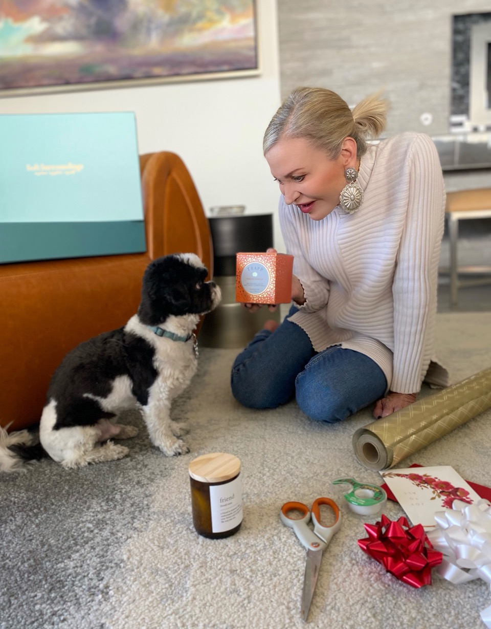 Lifestyle Influencer, Jamie Lewinger of More Than Turquoise with pet, Valentino and Soft Surroundings candle 