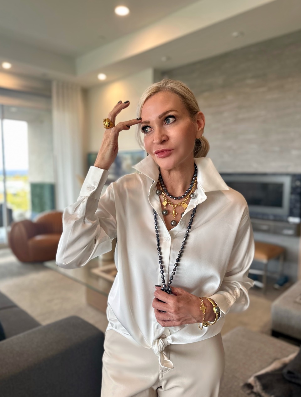 Lifestyle Influencer, Jamie Lewinger of More Than Turquoise wearing Julie Vos ring and cuff Bracelet in gold and laborite 