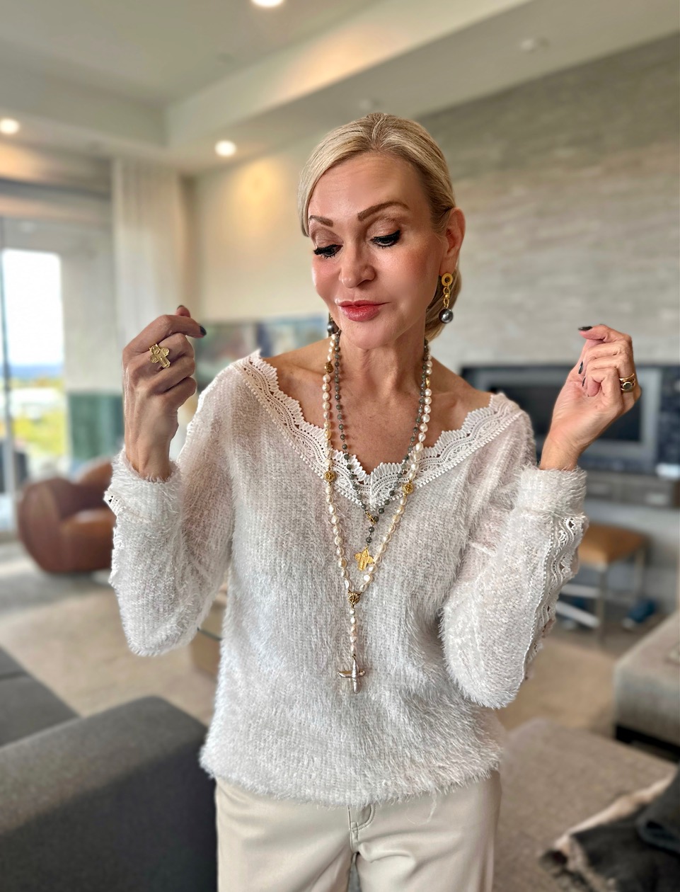 Lifestyle Influencer, Jamie Lewinger of More Than Turquoise wearing Julie Miles white pearl cross necklace 