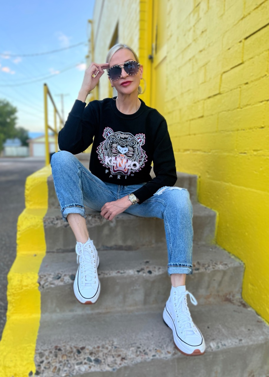 Lifestyle Influencer, Jamie Lewinger of More Than Turquoise wearing Kenzo sweatshirt  from Italist 