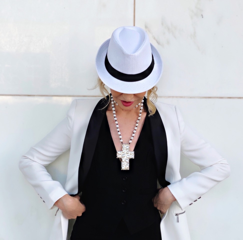 Lifestyle Influencer, Jamie Lewinger of More Than Turquoise in white fedora and Julie Miles pearl cross necklace 