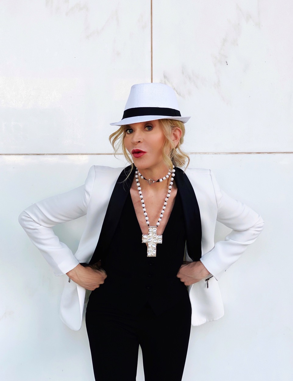 Lifestyle Influencer, Jamie Lewinger of More Than Turquoise wearing Julie Miles Pearl Cross necklace double wrapped 