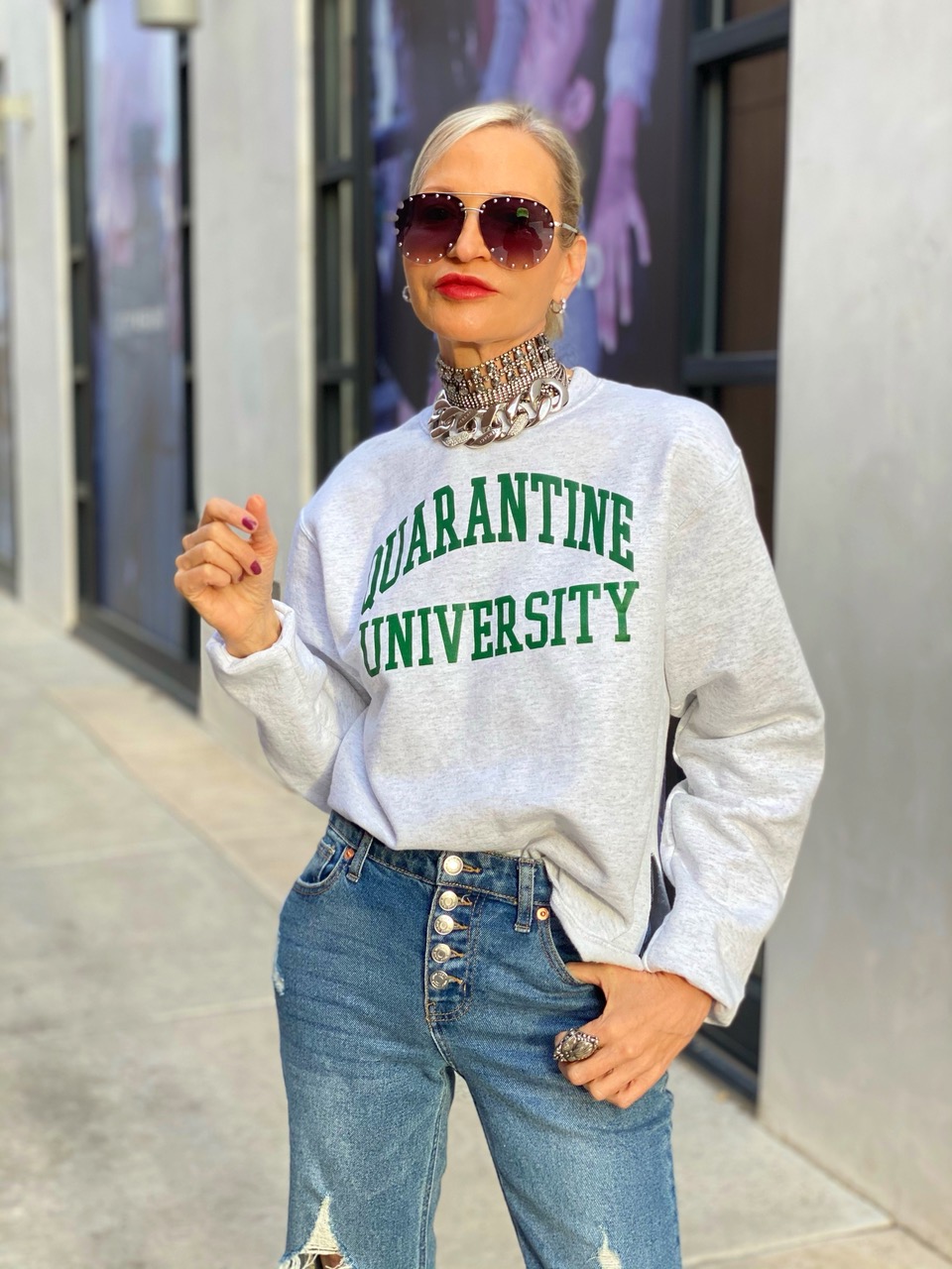 Lifestyle Influencer, Jamie Lewinger of More Than Turquoise, wearing a Quarantine University sweatshirt from Firstport  Company 