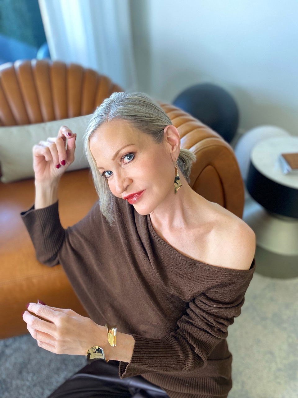 Lifestyle Influencer, Jamie Lewinger of More Than Turquoise, wearing gold plated Pamela Lauz Viento cuff bracelet 