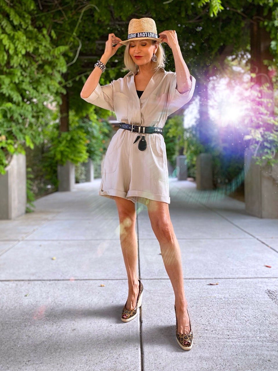 Lifestyle Influencer, Jamie Lewinger of More ThahTurquoise, wearing show willow tree romper
