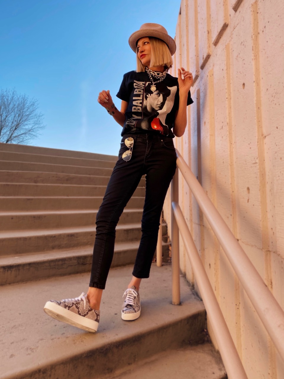 Lifestyle Influencer, Jamie Lewinger of More Than Turquoise, wearing the HERO snake skin print sneakers from SoleBliss Shoes