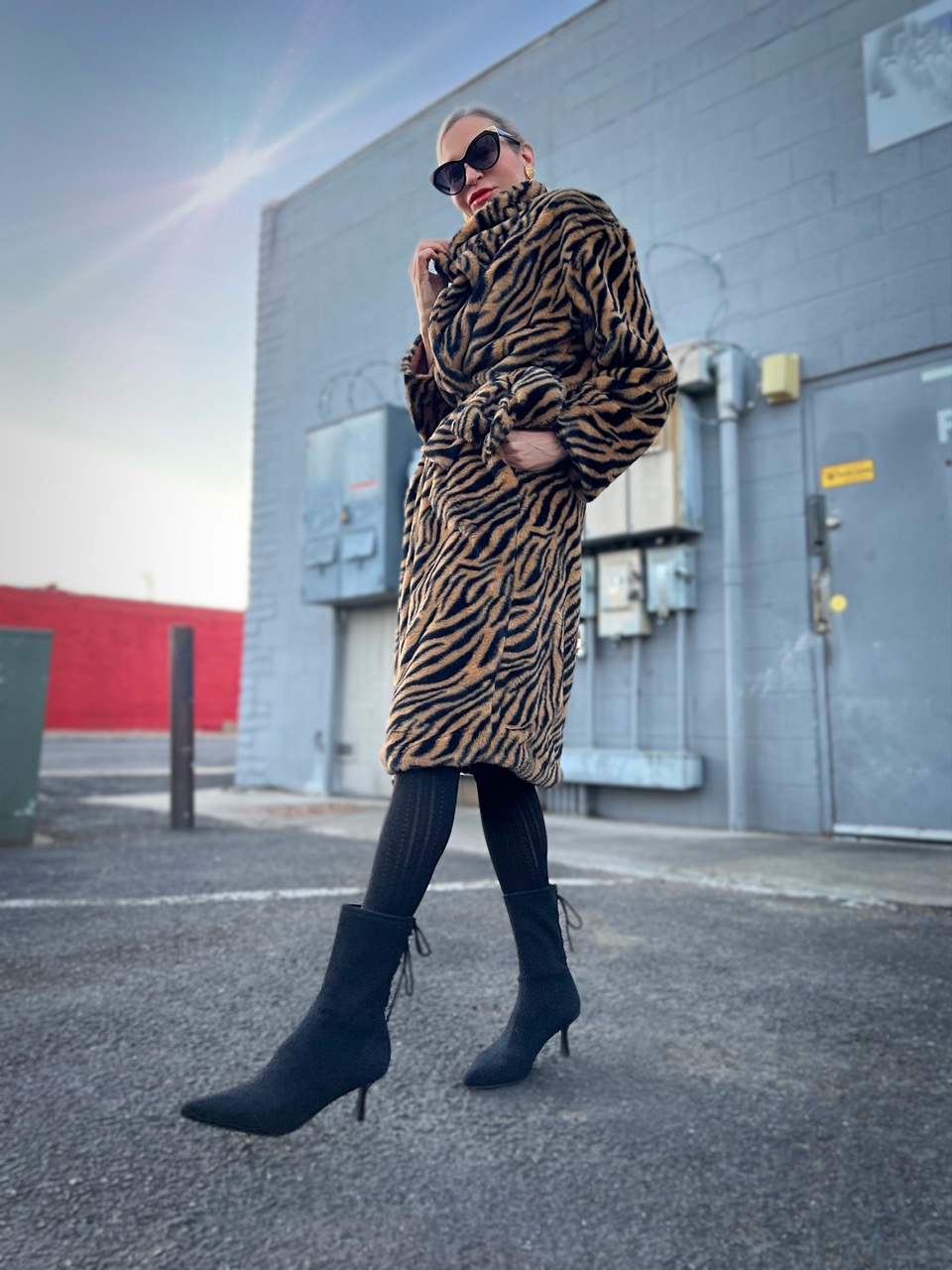 Lifestyle Influencer, Jamie Lewinger of More Than Turquoise, wearing Tiger print faux fur coat from SheIn