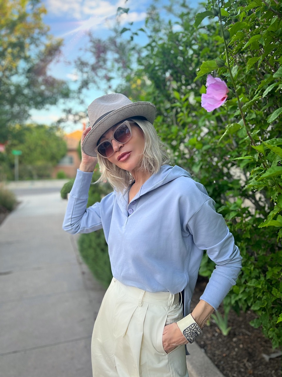 Lifestyle Influencer, Jamie Lewinger of More Than Turquoise wearing Universal Standard French Terry Hoodie in lavender 