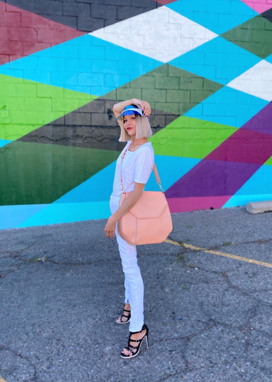 Lifestyle Influencer, Jamie Lewinger of More Than Turquoise wearing sporty DIOR visor