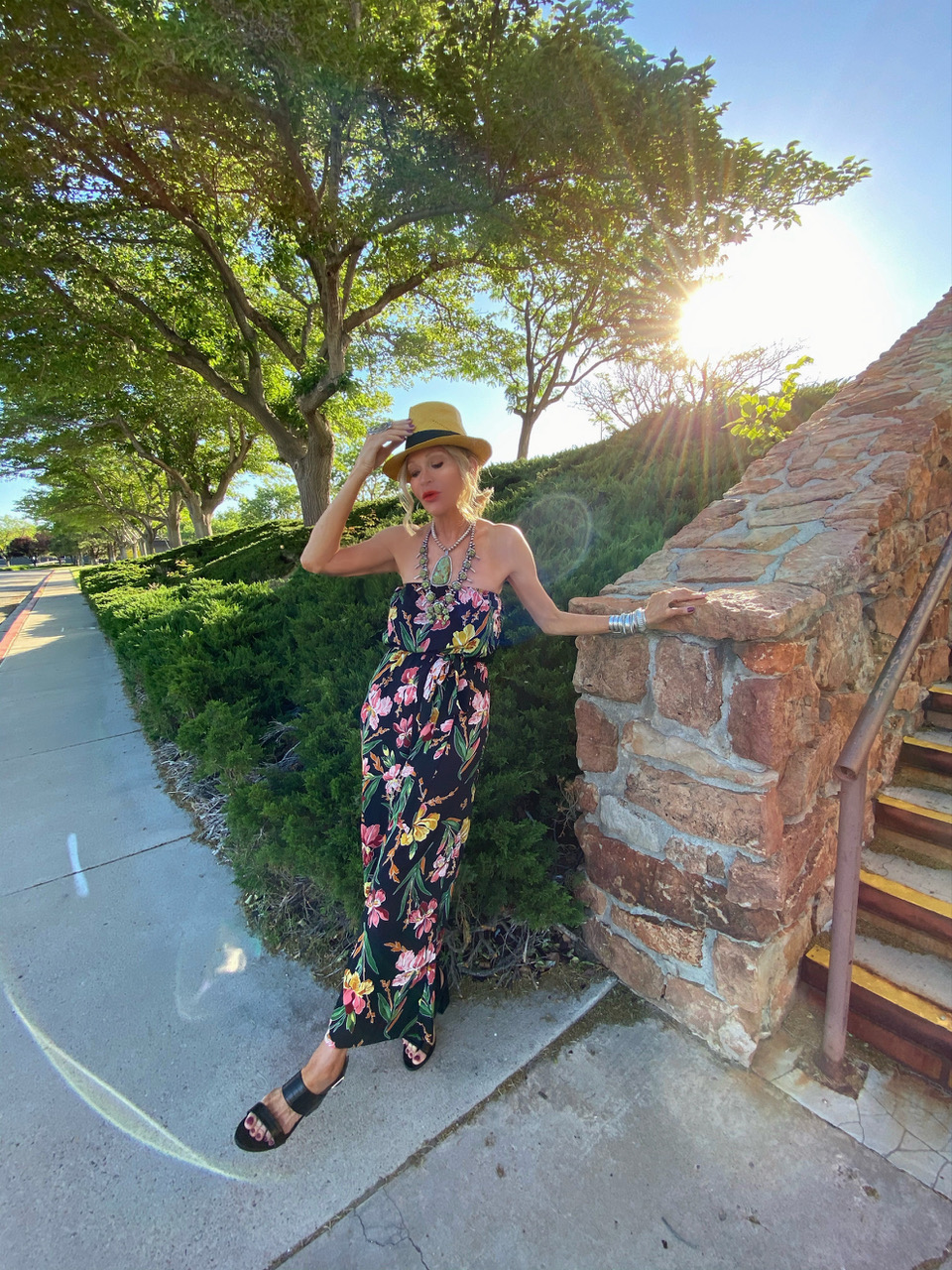 Lifestyle Influencer Jamie Lewinger of More Than Turquoise wearing straw hat from Savers