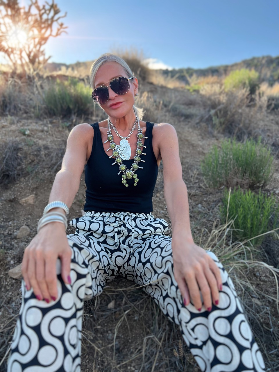 Lifestyle Influencer, Jamie Lewinger of More Than Turquoise wearing Zara graphic print cotton pants 